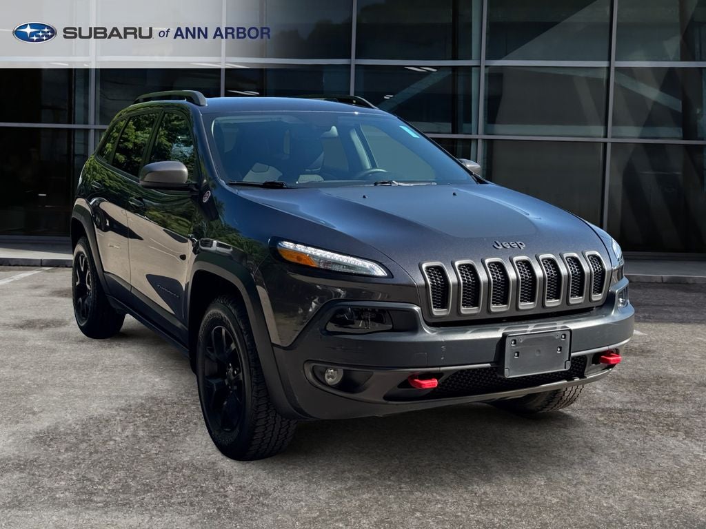 2016 Jeep Cherokee Trailhawk in Granite Crystal Metallic Clearcoat — front three-quarter view