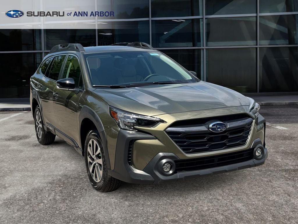 2025 Subaru Outback Premium **LIFETIME POWERTRAIN** in Autumn Green Metallic — front three-quarter view