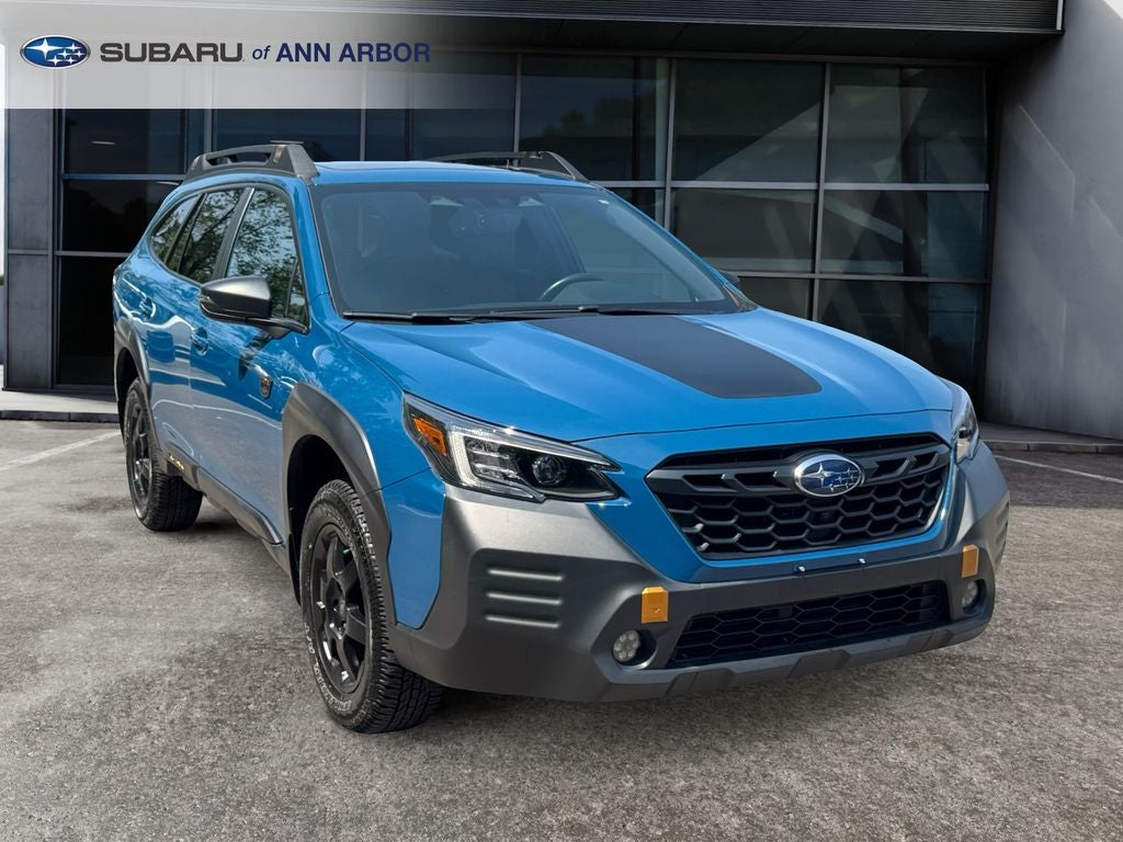2023 Subaru Outback Wilderness **LIFETIME POWERTRAIN** in Geyser Blue — front three-quarter view