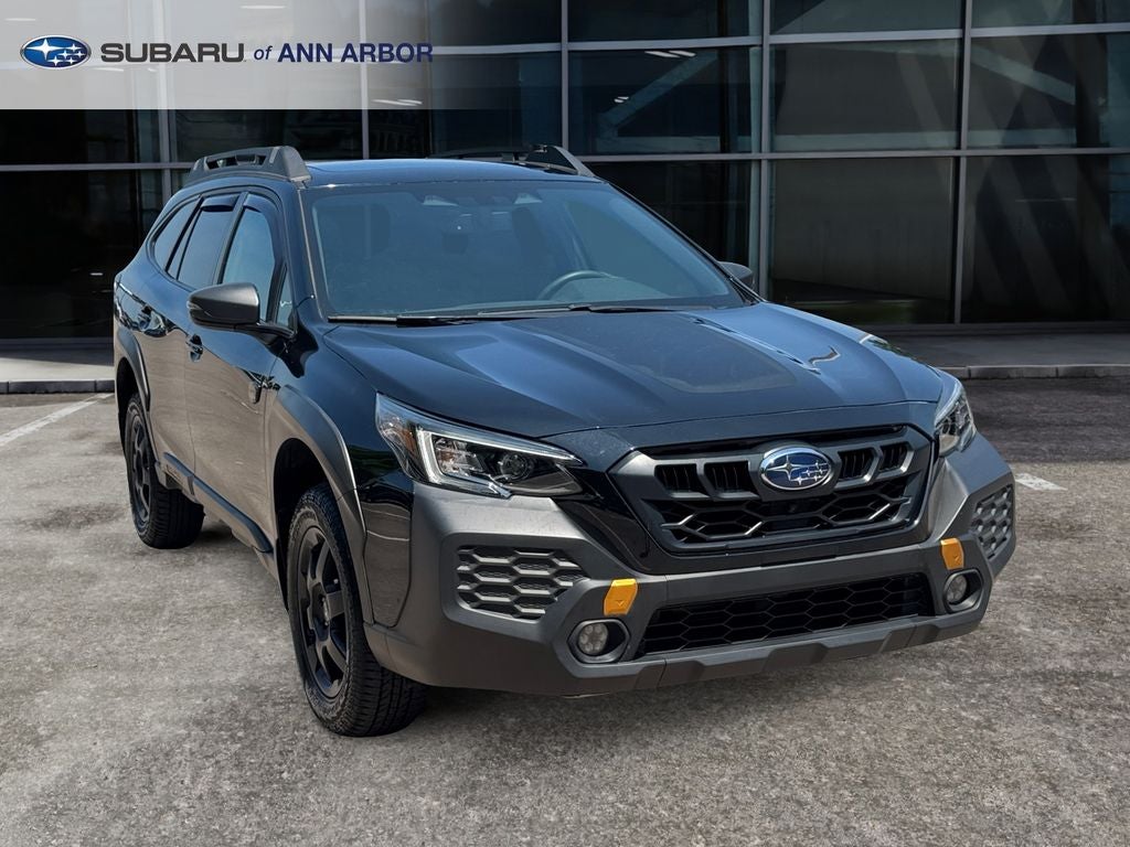 2024 Subaru Outback Wilderness **LIFETIME POWERTRAIN** in Crystal Black Silica — front three-quarter view