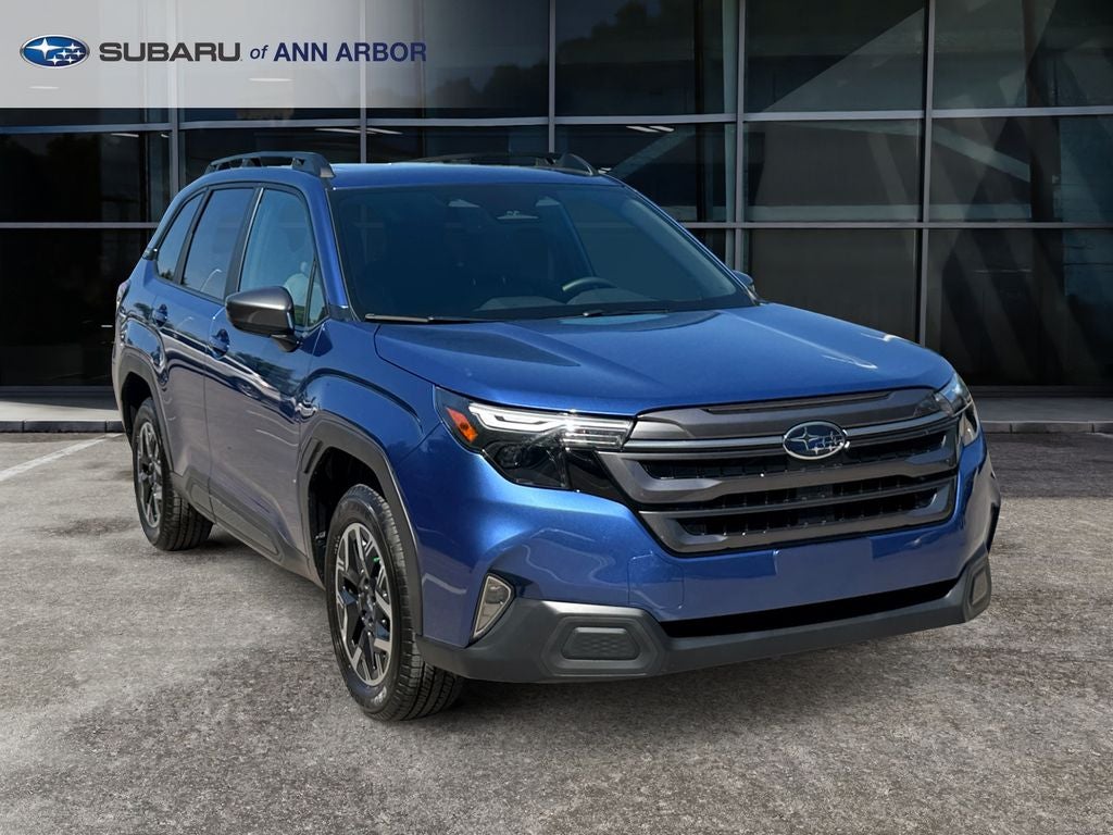 2026 Subaru Forester Premium *LIFETIME POWERTRAIN* in Daybreak Blue Pearl — front three-quarter view