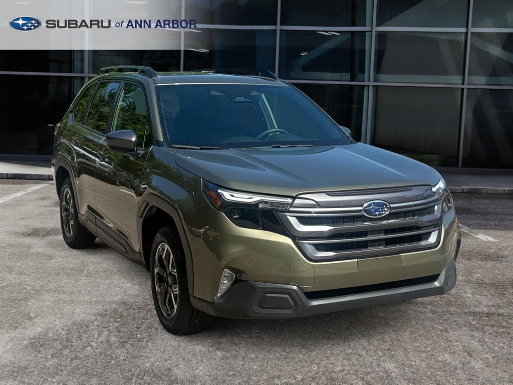 2026 Subaru Forester Premium **LIFETIME POWERTRAIN** in Autumn Green Metallic — front three-quarter view