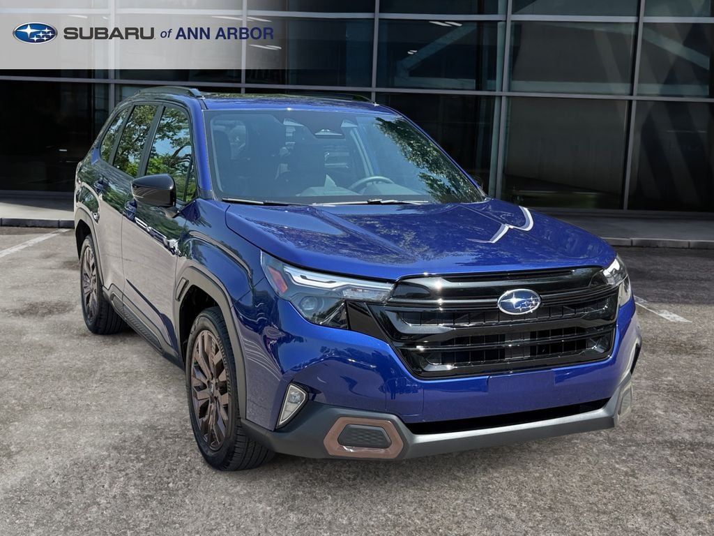 2026 Subaru Forester Sport **LIFETIME POWERTRAIN** in Sapphire Blue Pearl — front three-quarter view
