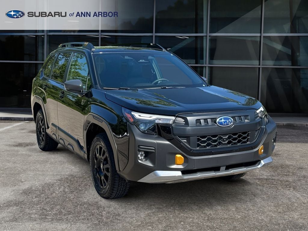 2026 Subaru Forester Wilderness **LIFETIME POWERTRAIN** in Crystal Black Silica — front three-quarter view