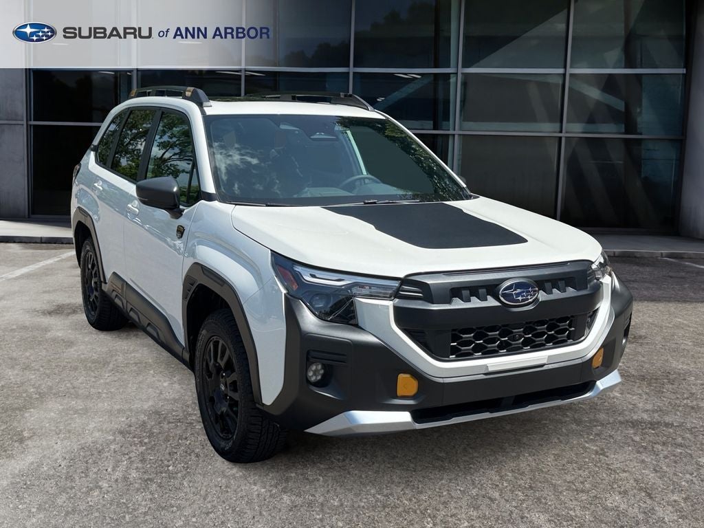 2026 Subaru Forester Wilderness **LIFETIME POWERTRAIN** in Crystal White Pearl — front three-quarter view
