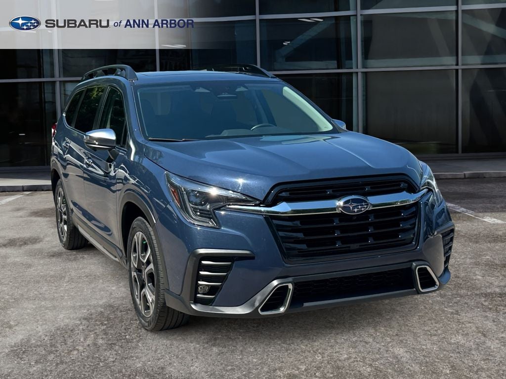 2023 Subaru Ascent Touring **LIFETIME POWERTRAIN** in Cosmic Blue Pearl — front three-quarter view