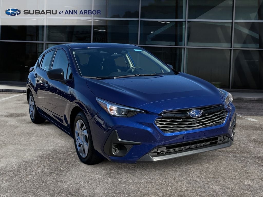 2024 Subaru Impreza Base **LIFETIME POWERTRAIN** in Sapphire Blue Pearl — front three-quarter view