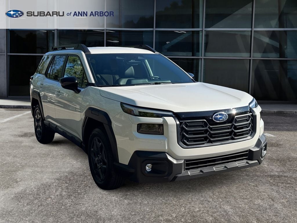 2026 Subaru Outback Premium **LIFETIME POWERTRAIN** in Crystal White Pearl — front three-quarter view