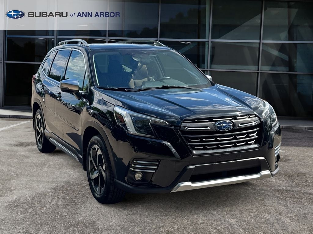 2022 Subaru Forester Touring **LIFETIME POWERTRAIN** in Crystal Black Silica — front three-quarter view