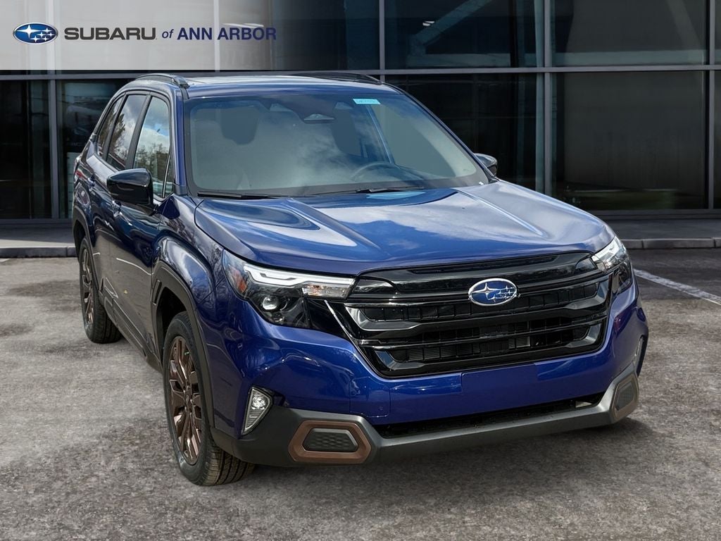 2026 Subaru FORESTER Sport in Sapphire Blue Pearl — front three-quarter view