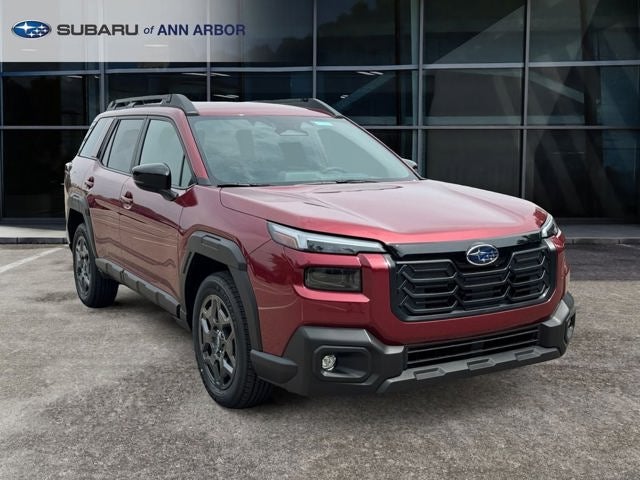 2026 Subaru OUTBACK Premium in Crimson Red Pearl — front three-quarter view