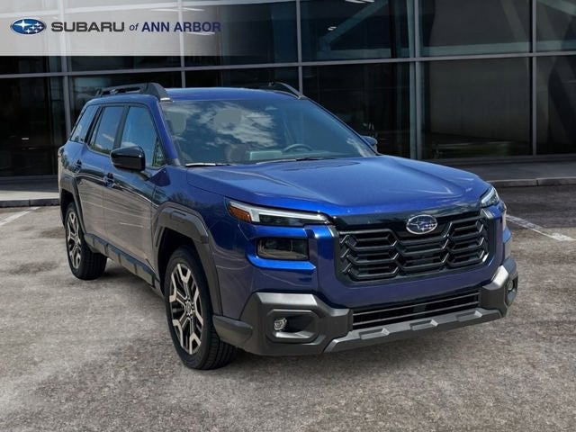 2026 Subaru OUTBACK Touring XT in Sapphire Blue Pearl — front three-quarter view