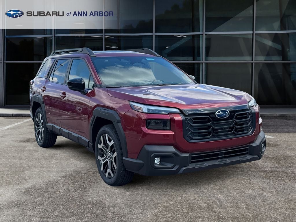 2026 Subaru OUTBACK Touring XT in Crimson Red Pearl — front three-quarter view