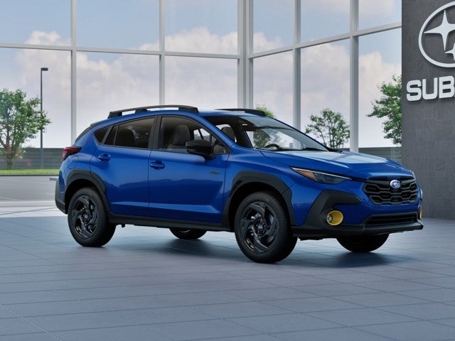 2026 Subaru CROSSTREK Sport Hybrid in Sapphire Blue Pearl — front three-quarter view