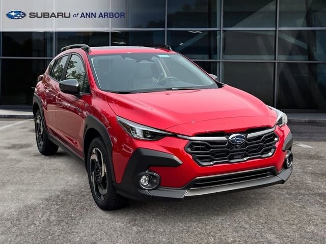 2026 Subaru CROSSTREK Limited Hybrid in Pure Red — front three-quarter view