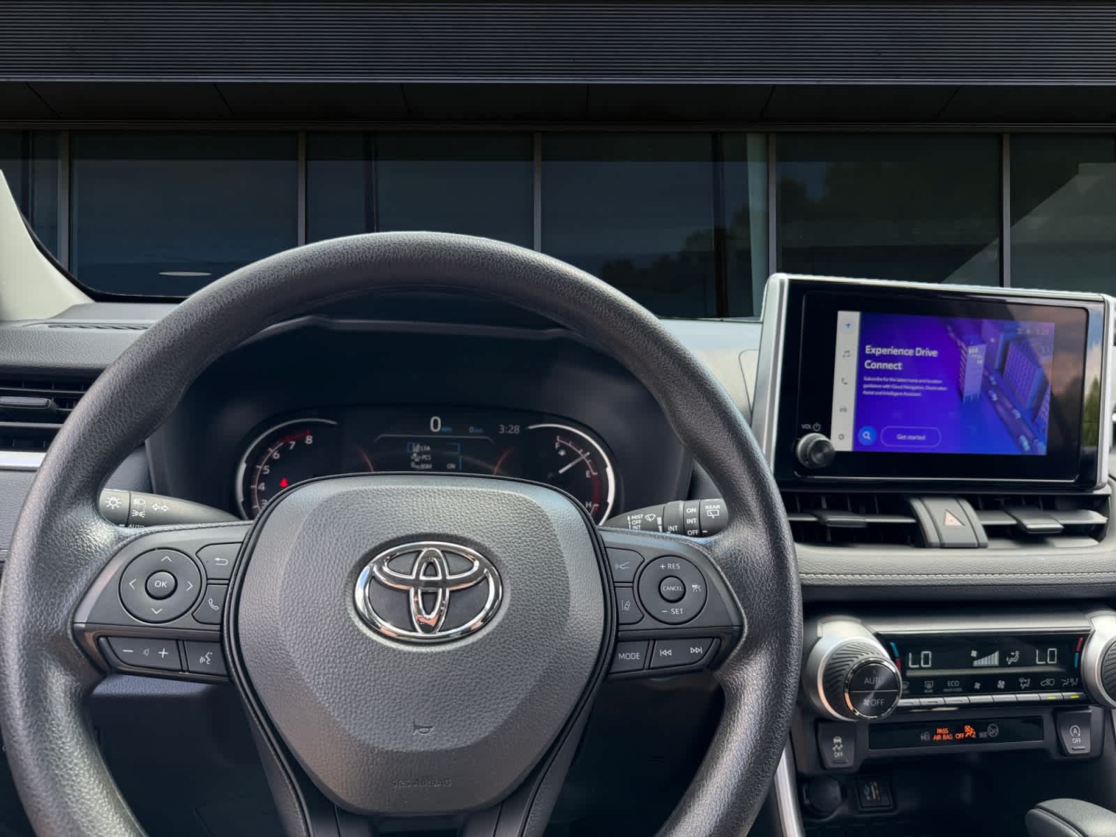 2025 Toyota RAV4 — rear three-quarter view