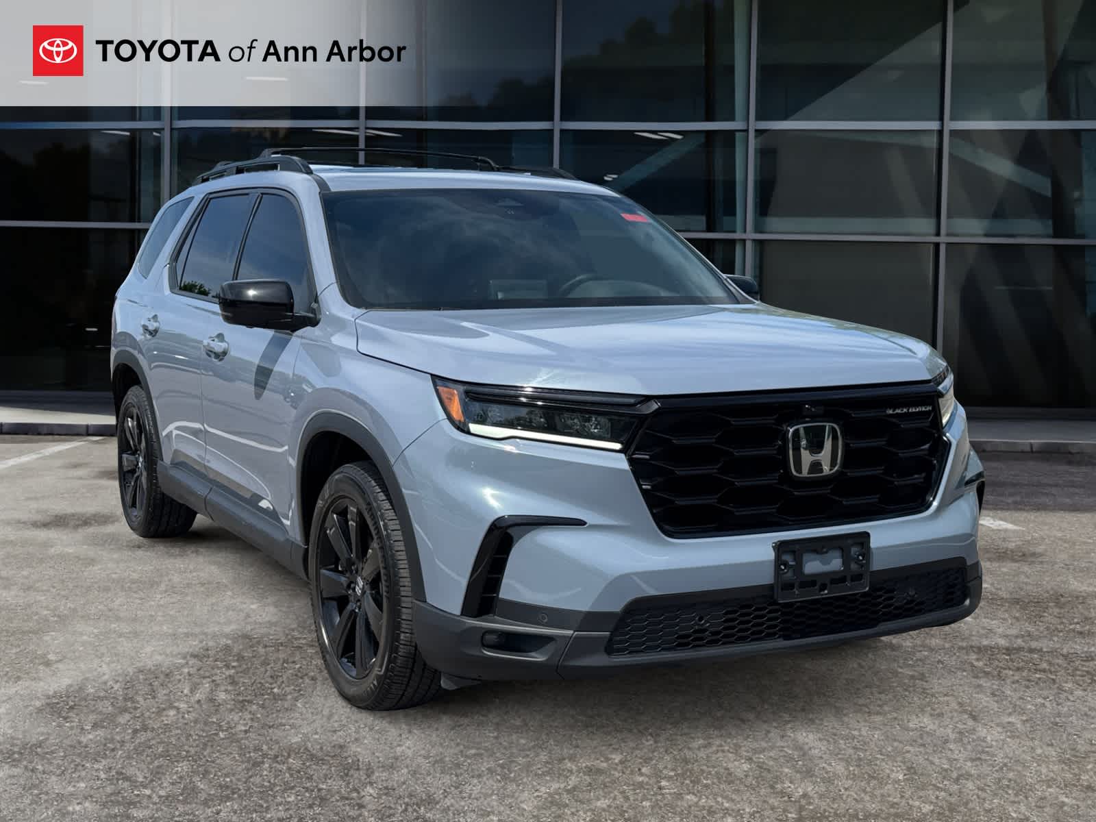 2025 Honda Pilot Black Edition in Sonic Gray Pearl — front three-quarter view
