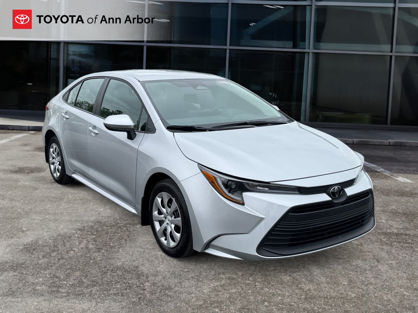 2024 Toyota Corolla LE in Classic Silver Metallic — front three-quarter view
