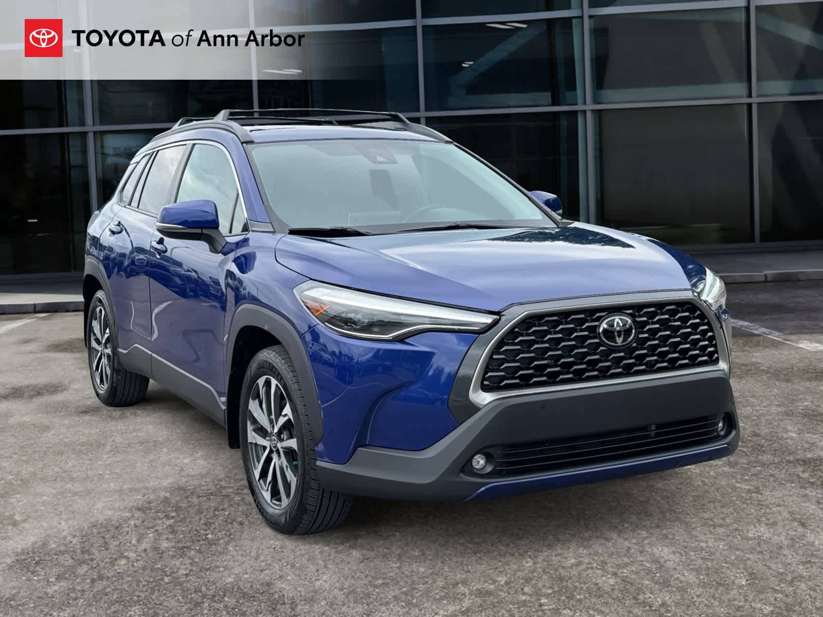 2022 Toyota Corolla Cross XLE in Blue Crush Metallic — front three-quarter view